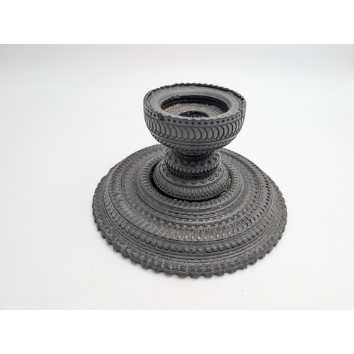 113 - 19th C. Irish bog oak candlestick. {10 cm H x 15 cm Dia.}.
