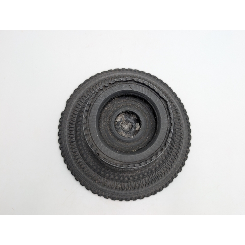 113 - 19th C. Irish bog oak candlestick. {10 cm H x 15 cm Dia.}.