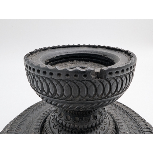 113 - 19th C. Irish bog oak candlestick. {10 cm H x 15 cm Dia.}.