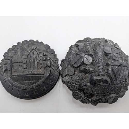 13 - Collection of nine 19th C. Irish bog oak boxes with various carvings of Wolfhound, Muckross Abbey et... 