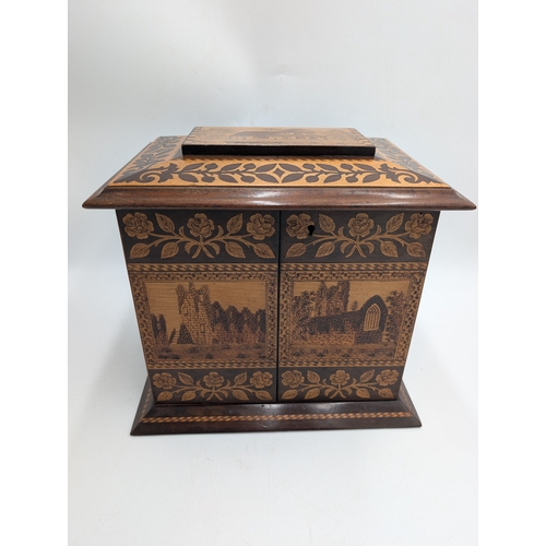 143 - 19th C. Irish Killarney wood arbutus and marquetry Cigar cabinet, the lid inlaid with vignette of Gl... 
