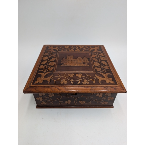 147 - 19th C. Irish Killarney wood arbutus and marquetry box, the lid inlaid with vignette of Muckross Abb... 
