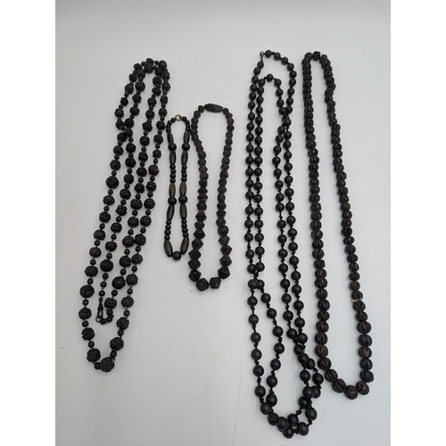 148 - Five 19th C. Irish box oak necklaces.