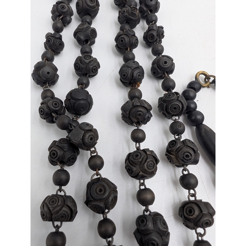 148 - Five 19th C. Irish box oak necklaces.