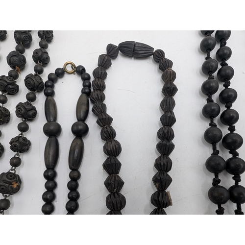 148 - Five 19th C. Irish box oak necklaces.