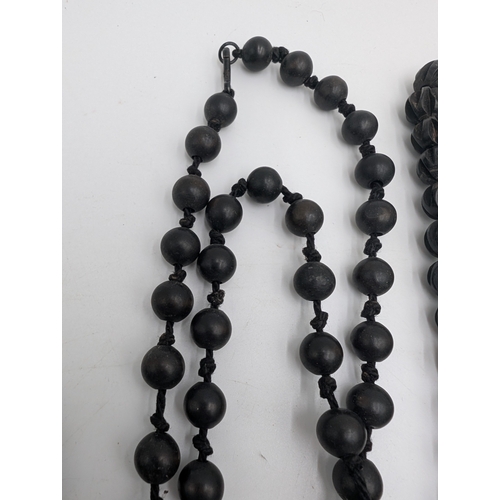 148 - Five 19th C. Irish box oak necklaces.