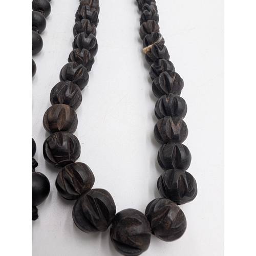 148 - Five 19th C. Irish box oak necklaces.