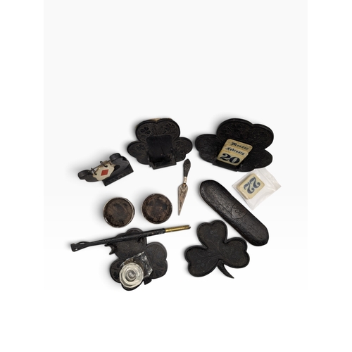 15 - Collection of nine pieces of 19th C. Irish bog oak including calendars, pin tray and Bridge counter.... 