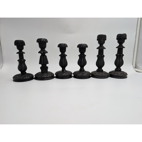 18 - Six 19th C. Irish bog oak candlesticks. {15 cm H x 8 cm Dia.}.