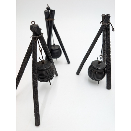 19 - Seven 19th C. Irish bog oak pot stands and spinning wheel. {12 cm H x 4 cm W x 4 cm D} approx.