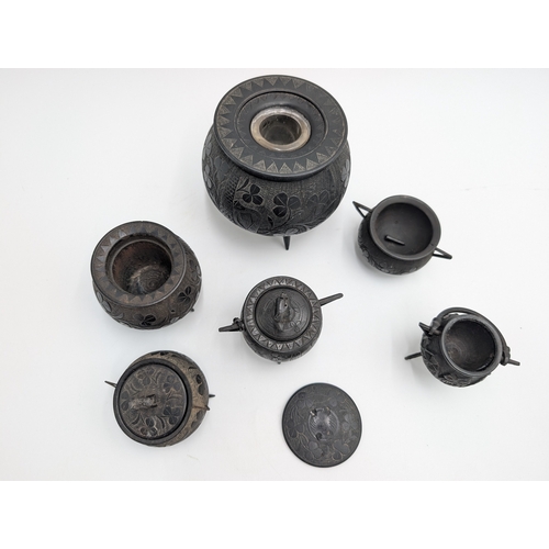 20 - Six items of 19th C. Irish bog oak including three legged pot inkwell and other pots. {10 cm H x 11 ... 