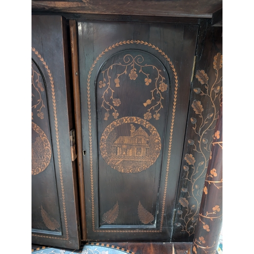 206 - 19th. C. Irish Killarney wood arbutus and marquetry davenport the raised panel back inlaid with a ce... 