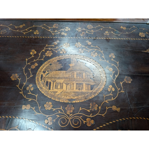 206 - 19th. C. Irish Killarney wood arbutus and marquetry davenport the raised panel back inlaid with a ce... 
