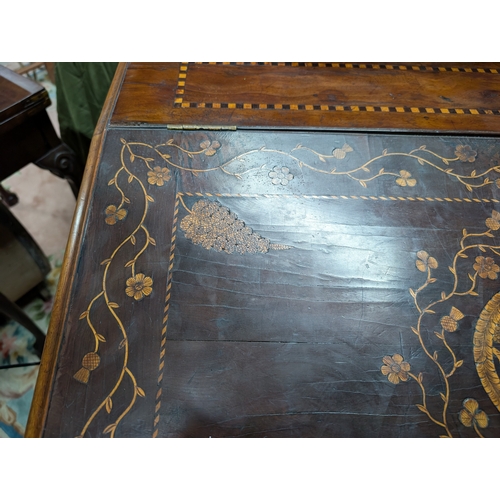206 - 19th. C. Irish Killarney wood arbutus and marquetry davenport the raised panel back inlaid with a ce... 