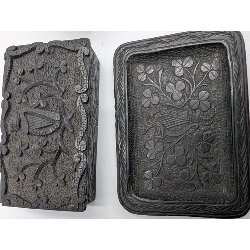 21 - Collection of seven 19th C. Irish bog oak lidded boxes and a tray decorated with Shamrocks. {2 cm H ... 