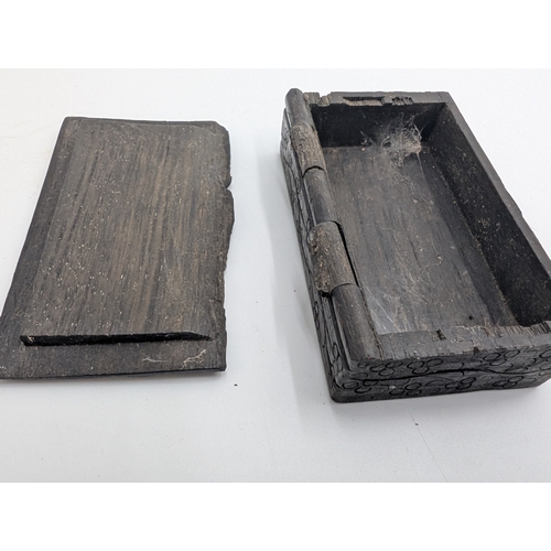 21 - Collection of seven 19th C. Irish bog oak lidded boxes and a tray decorated with Shamrocks. {2 cm H ... 