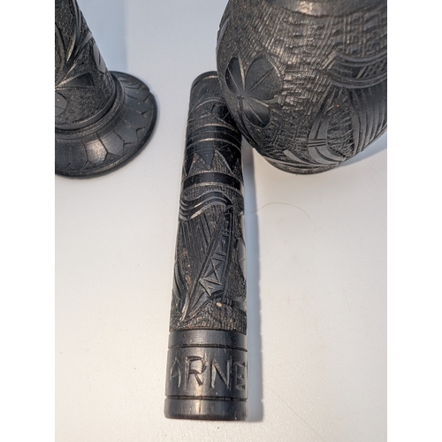 22 - Lot of 19th C. Irish bog oak sewing related items including pin cushions, pin holders etc.