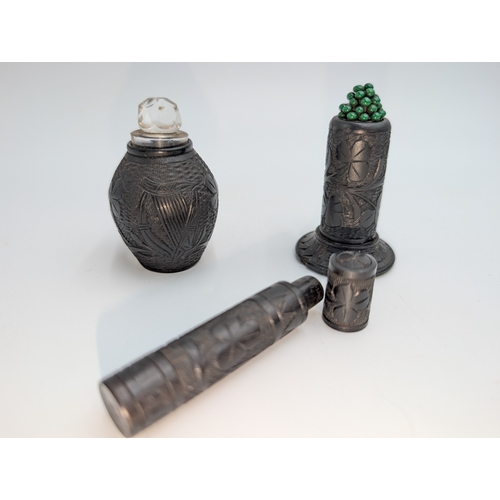 22 - Lot of 19th C. Irish bog oak sewing related items including pin cushions, pin holders etc.