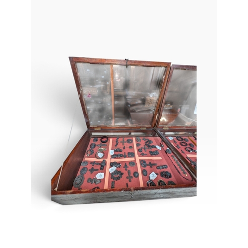 28 - Early 20th C. mahogany glazed counter display cabinet with key. {25 cm H x 145 cm W x 67 cm D}.