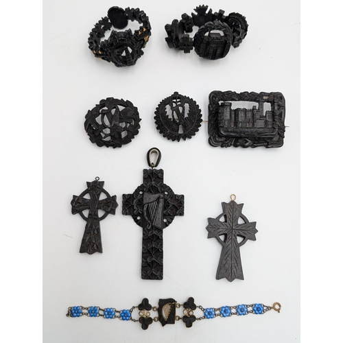 29 - Nine pieces of 19th C. Irish bog oak jewellery including three brooches, three bracelets and three c... 
