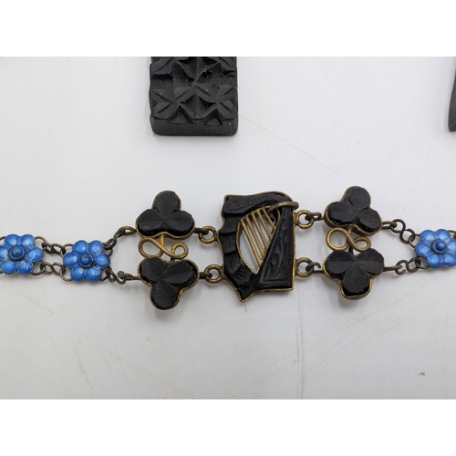 29 - Nine pieces of 19th C. Irish bog oak jewellery including three brooches, three bracelets and three c... 