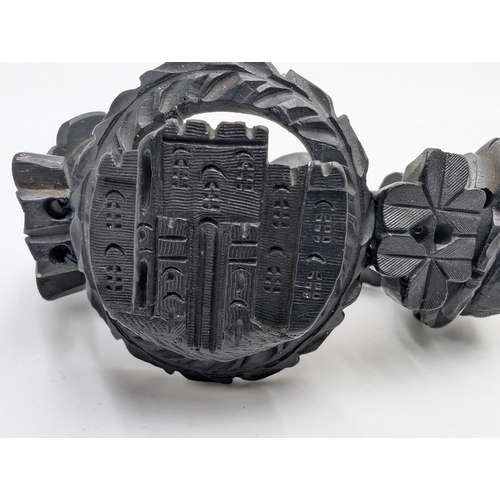 29 - Nine pieces of 19th C. Irish bog oak jewellery including three brooches, three bracelets and three c... 