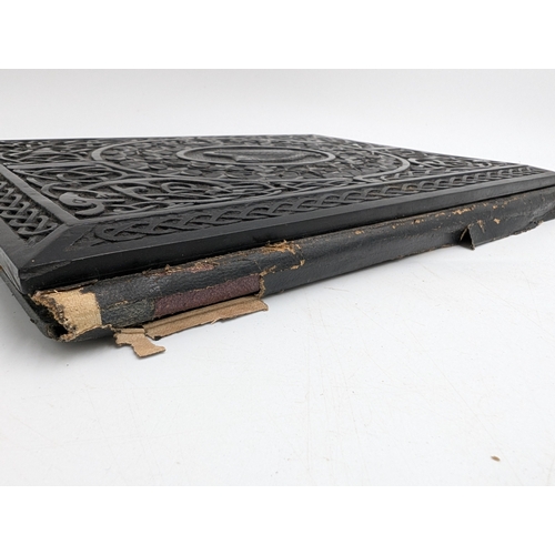 296 - 19th C. Irish carved bog oak Ledger decorated with Shamrocks and central Harp design. {31 cm H x 23 ... 