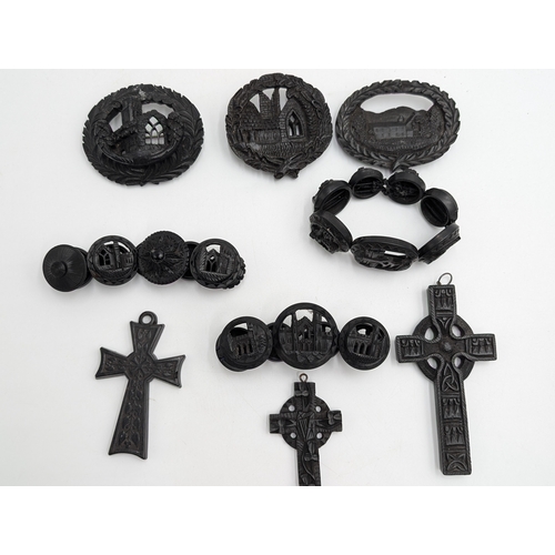30 - Nine pieces of 19th C. Irish bog oak jewellery including three brooches, three bracelets and three c... 