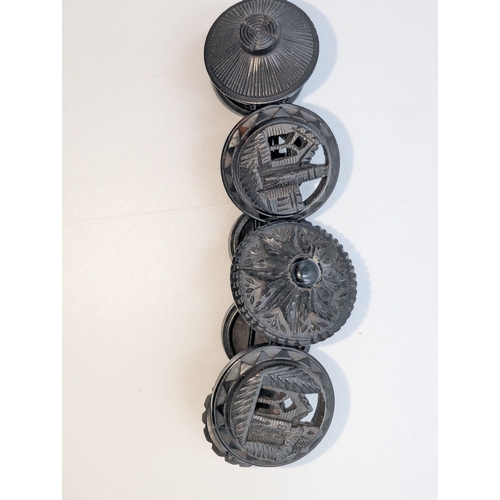 30 - Nine pieces of 19th C. Irish bog oak jewellery including three brooches, three bracelets and three c... 