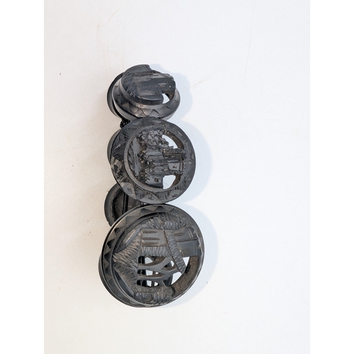 30 - Nine pieces of 19th C. Irish bog oak jewellery including three brooches, three bracelets and three c... 