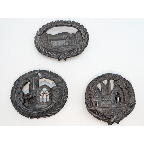 30 - Nine pieces of 19th C. Irish bog oak jewellery including three brooches, three bracelets and three c... 