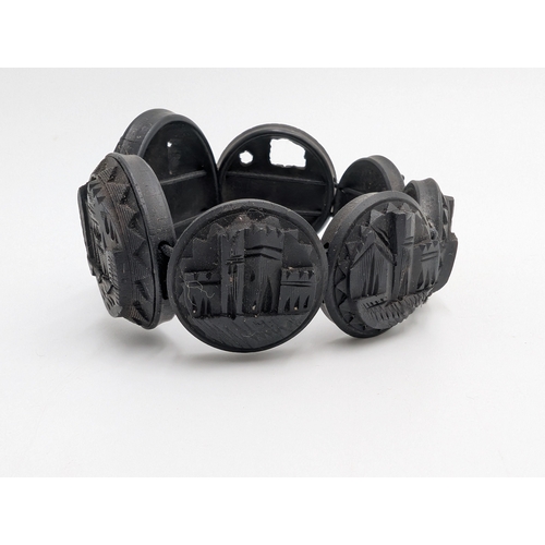 32 - Nine pieces of 19th C. Irish bog oak jewellery including three brooches, three bracelets and three c... 