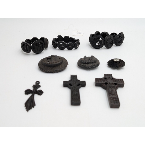 32 - Nine pieces of 19th C. Irish bog oak jewellery including three brooches, three bracelets and three c... 