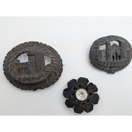 32 - Nine pieces of 19th C. Irish bog oak jewellery including three brooches, three bracelets and three c... 