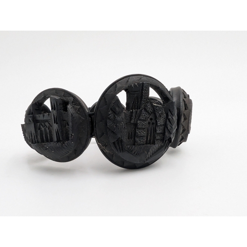 32 - Nine pieces of 19th C. Irish bog oak jewellery including three brooches, three bracelets and three c... 