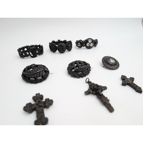 33 - Nine pieces of 19th C. Irish bog oak jewellery including three brooches, three bracelets and three c... 