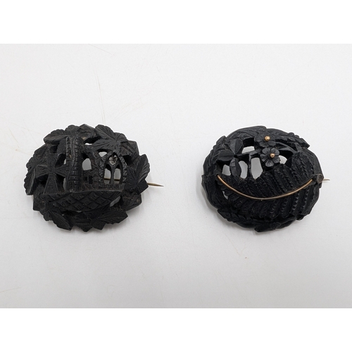 33 - Nine pieces of 19th C. Irish bog oak jewellery including three brooches, three bracelets and three c... 