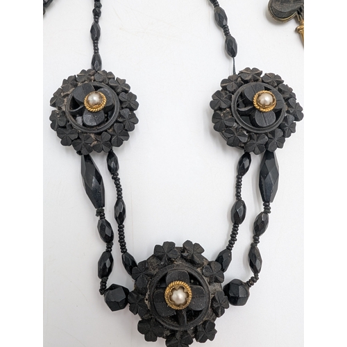 34 - 19th C. Irish bog oak necklace, Shamrock bracelet and brooch.