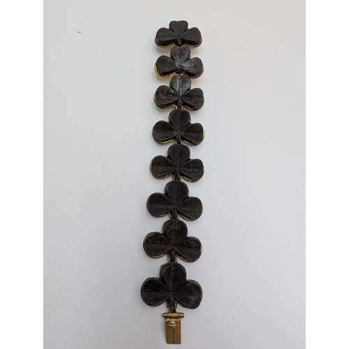 34 - 19th C. Irish bog oak necklace, Shamrock bracelet and brooch.