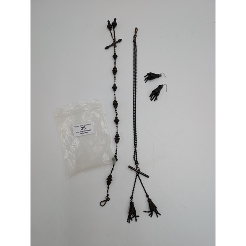 35 - Two 19th C. Irish bog oak necklaces and pair of earrings.
