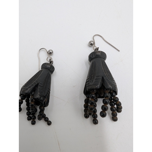 35 - Two 19th C. Irish bog oak necklaces and pair of earrings.