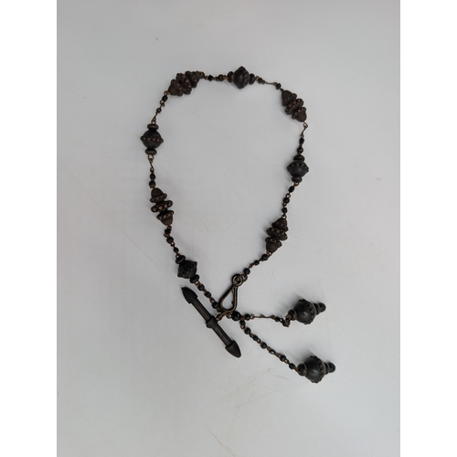 35 - Two 19th C. Irish bog oak necklaces and pair of earrings.