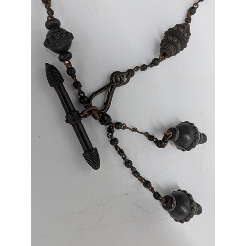 35 - Two 19th C. Irish bog oak necklaces and pair of earrings.