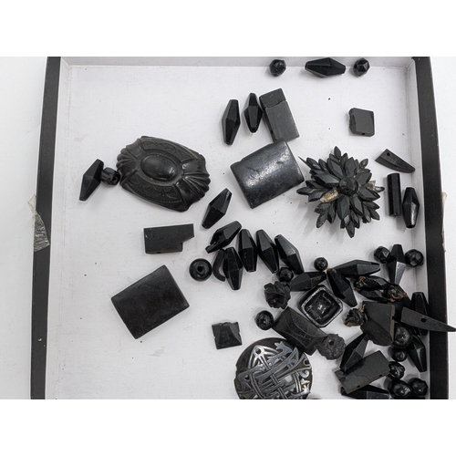 36 - Miscellaneous lot of 19th C. Irish bog oak jewellery including cross pendant, necklaces and other in... 