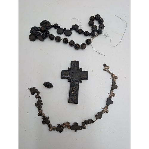 36 - Miscellaneous lot of 19th C. Irish bog oak jewellery including cross pendant, necklaces and other in... 