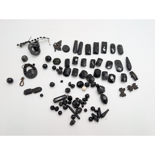 36 - Miscellaneous lot of 19th C. Irish bog oak jewellery including cross pendant, necklaces and other in... 