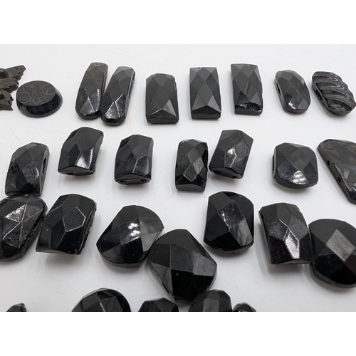 36 - Miscellaneous lot of 19th C. Irish bog oak jewellery including cross pendant, necklaces and other in... 