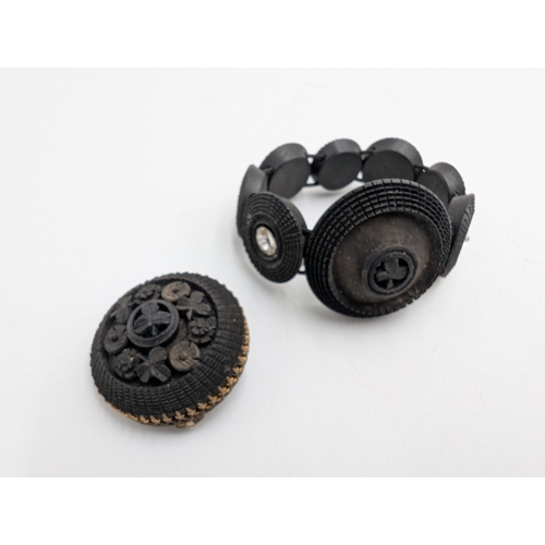 39 - Three 19th C. Irish bog oak crosses, three bracelets and three brooches.