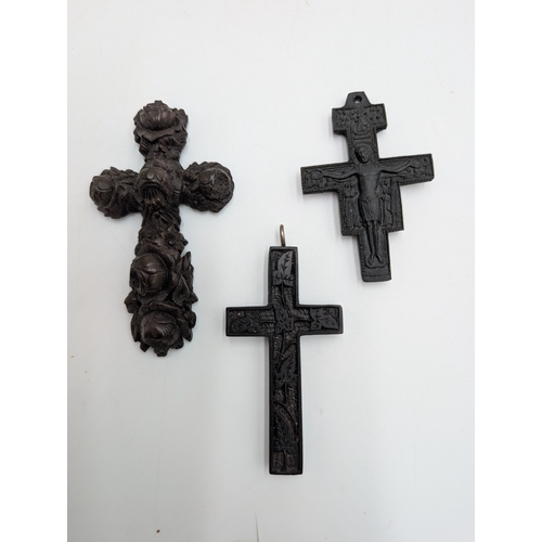 40 - Three 19th C. Irish bog oak crosses, three bracelets and three brooches.