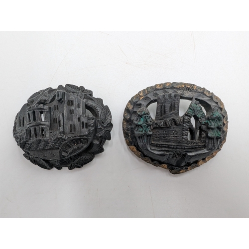 40 - Three 19th C. Irish bog oak crosses, three bracelets and three brooches.